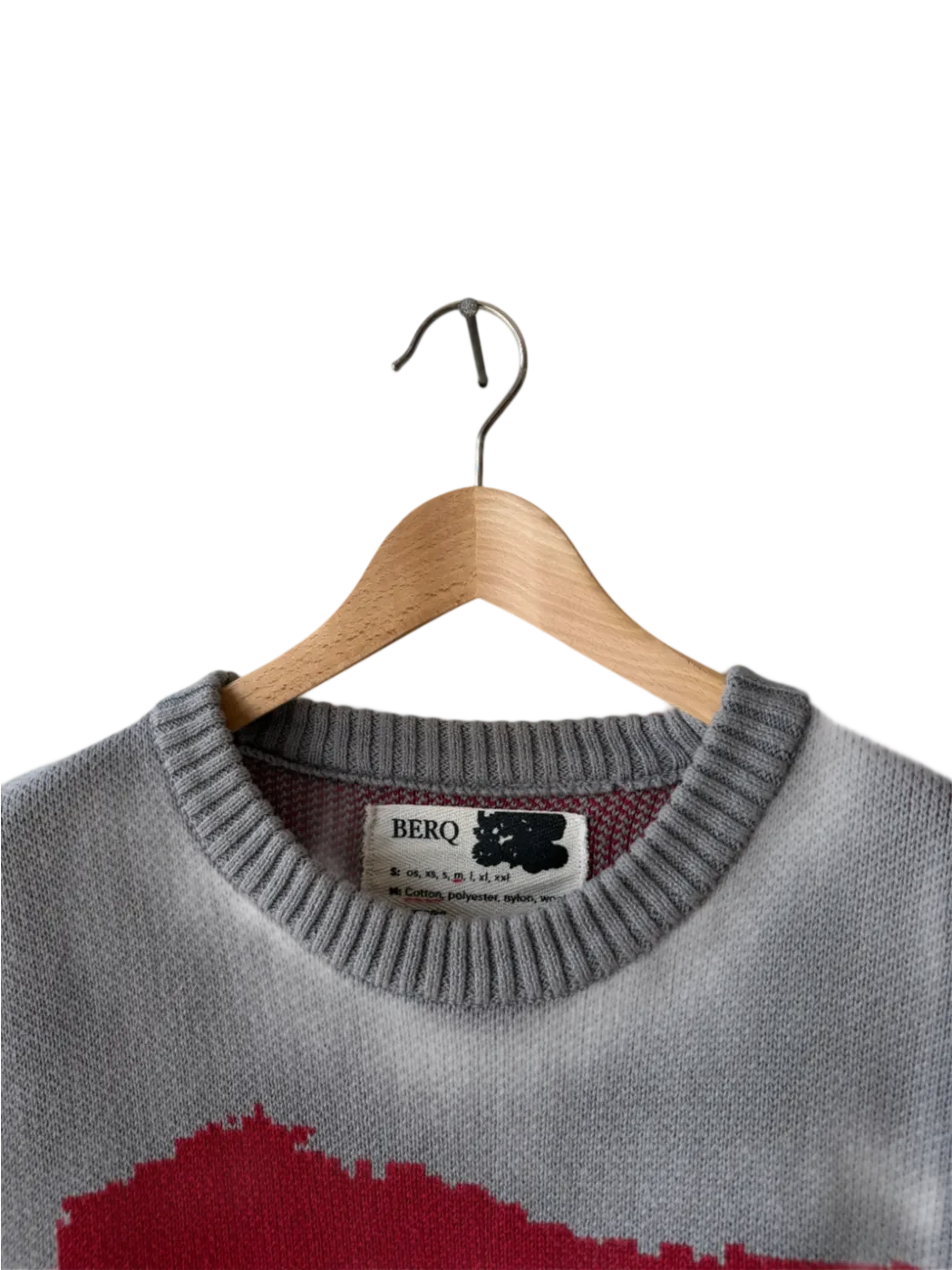 Close-up of the ribbed neckline and BERQ label