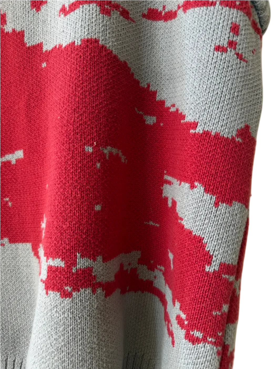 Close-up of the red jacquard motif on the front